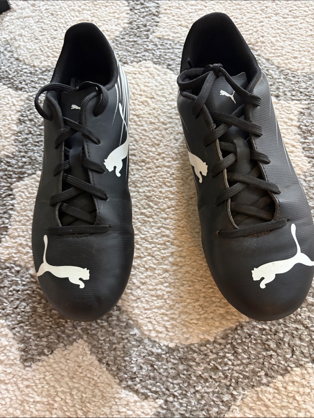 Puma Kids Black Soccer Cleats with White Puma Logos